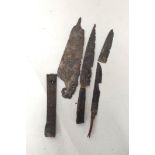 Collection of four Iron Age knife bade fragments all in relic condition. One with a bronze handle