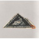1855 Cape of Good Hope 6d imperforated triangular stamp with red postmark.