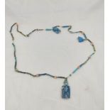 Ancient Egyptian. Glass and steatite bead necklace measuring 39cm in length with enamel pharaoh