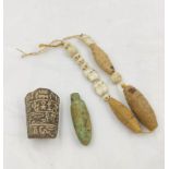 Ancient Egyptian. Artifacts to include a pottery fragment incised with hieroglyphs, a faience toggle