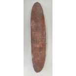 Antique Australian aboriginal wooden Churinga shield of elongated ovoid form and decorated profusely