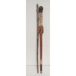 African hardwood tribal ceremonial staff decorated with a carving of a nude female. Also a leather