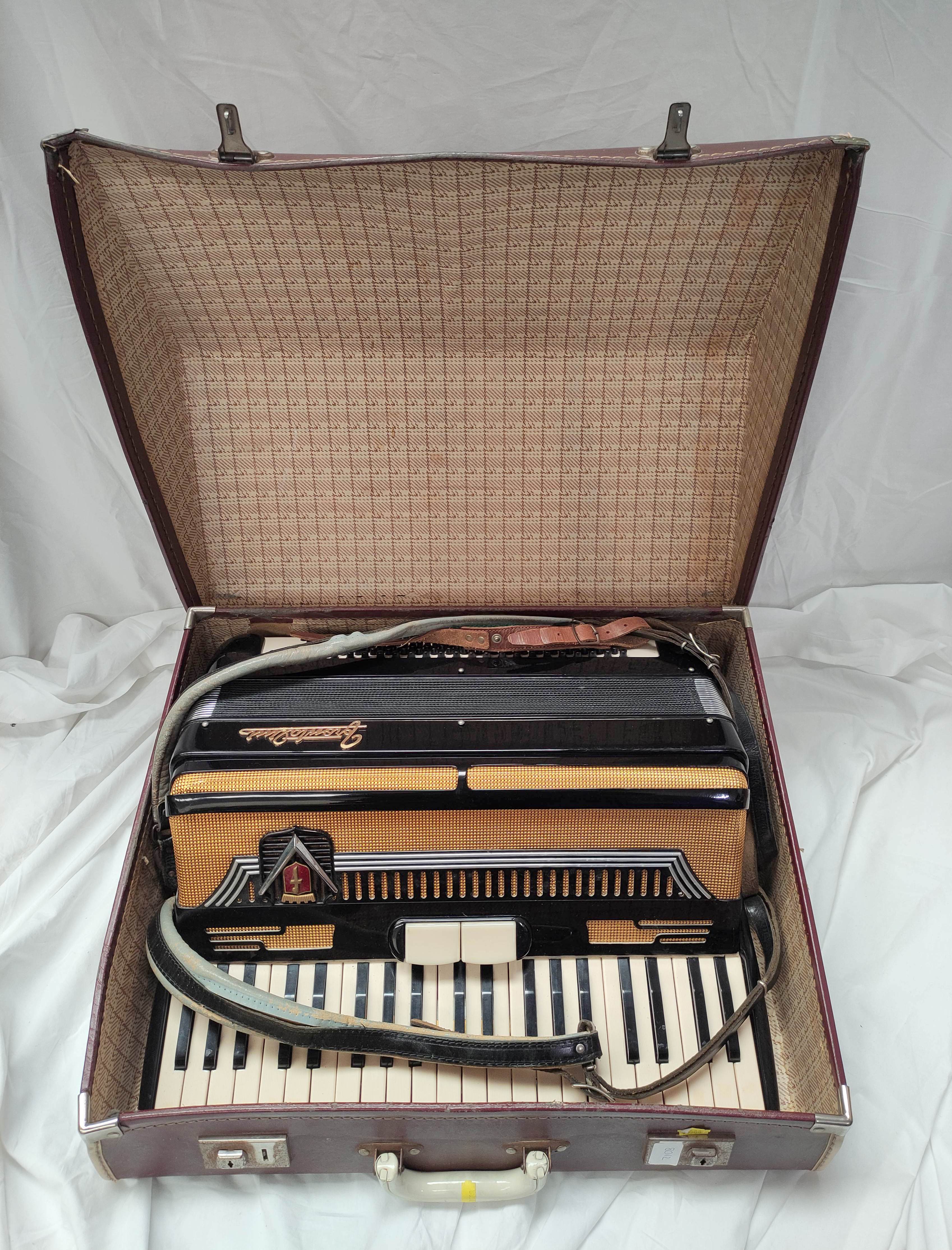 Broutalini boxed accordion in fitted case.