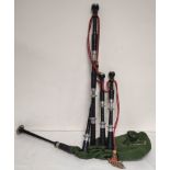 Vintage Highland bagpipes with pewter mounts and synthetic Canmore bag. Unattributed