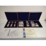 Three collector's coin sets by the Windsor Mint. To include British Banknotes Golden Bars six