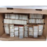 Box containing a large collection of world postage stamps from the estate of a local collector.