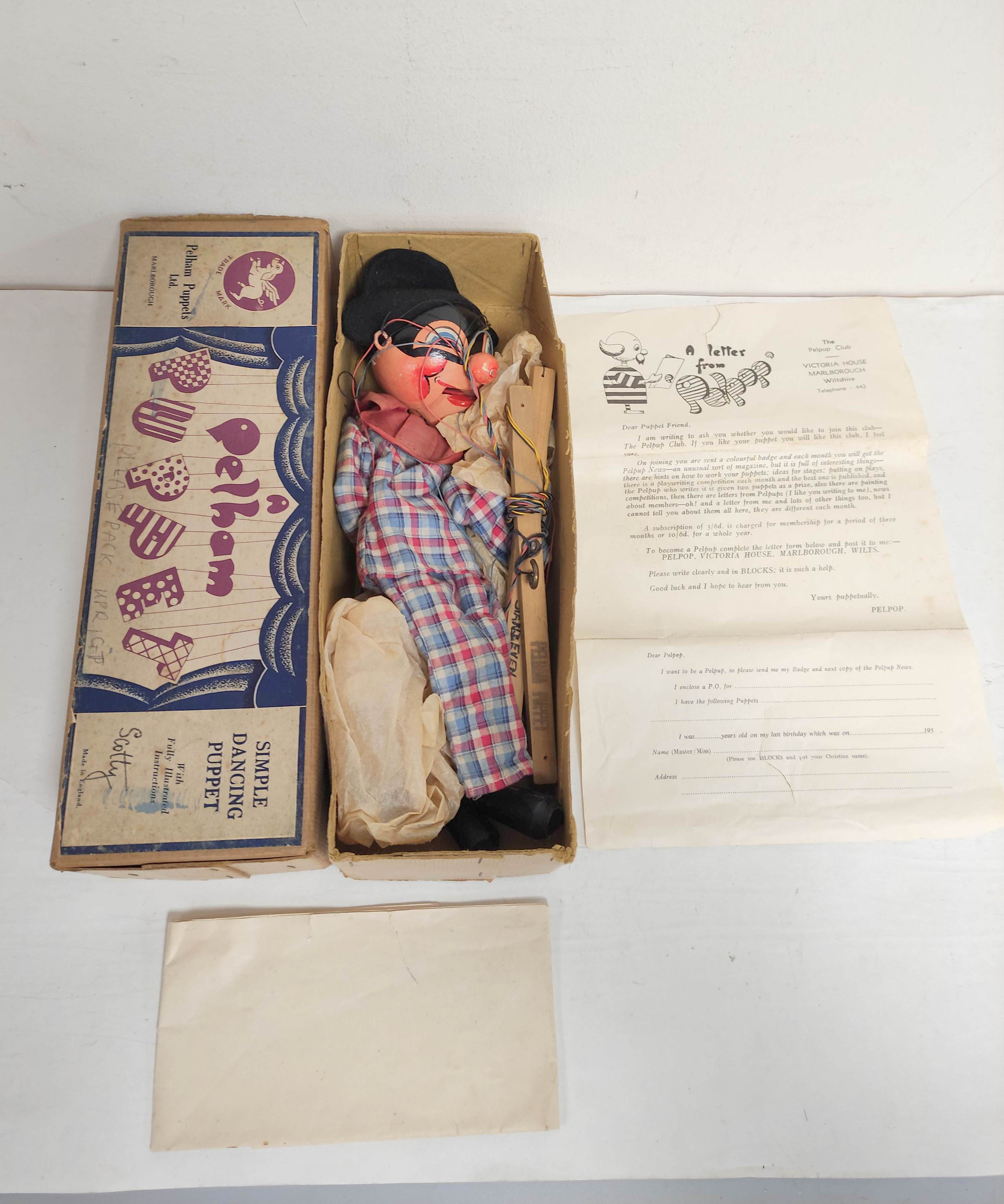 Scarce Pelham Puppet Harlequin type SM marionette with box, instructions and fan club letter.