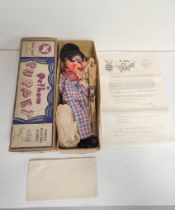 Scarce Pelham Puppet Harlequin type SM marionette with box, instructions and fan club letter.