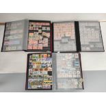 British Commonwealth & World. Three postage stamp albums arranged alphabetically by country