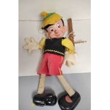 Scarce large 1950s Pelham Puppet marionette modelled after Walt Disney's Pinocchio. Features moulded