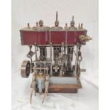 Early 20th century model three cylinder compound marine steam engine of cast iron construction,