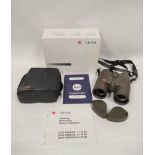 Leica 10x42 BA binoculars in olive green finish with micro-adjustment focusing wheel complete with