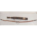 Subsaharan African tribal leather bound pleated quiver containing nine barbed arrows with bamboo
