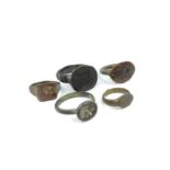 Roman/Medieval. Collection of five Roman to Medieval finger rings to include signet examples. All