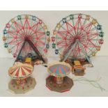 Four Faller fairground construction sets to include two Ferris wheels and two carousels. All