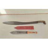 Two tribal edged knifes to include a machete with horn grip from Ayutla Mexico & an African Maasai