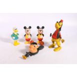 Vintage Walt Disney Productions toys including a Burbank Toys Ltd Mickey Mouse pull string toy,