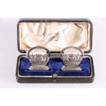 Pair of naval interest silver placename or menu holders in the form of crowns by Gieves Ltd,