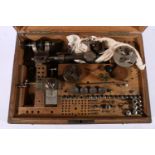 Watchmakers lathe with accessories in fitted wooden case bearing a plaque 'G BOLEY'.