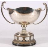 George V sterling silver twin-handled trophy on hardwood stand, 'Telford Park Lawn Tennis CLub, Mon,
