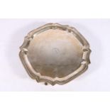 Indian sterling silver salver with pie crust edge on four scroll feet, Hamilton and Co, Calcutta,