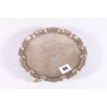 George VI sterling silver salver with pie crust edge a scroll feet, Hamilton and Inches,