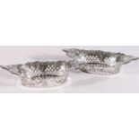 Pair of sterling silver pierced bonbon dishes, with foliate decoration, maker A & J Z, Birmingham,