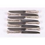 Set of eight sterling silver handled table knives, Roberts and Belle Ltd, Sheffield, 1938/1963?