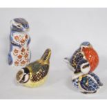 Four Royal Crown Derby animal paperweights modelled as an otter, duck and two birds, stopper to