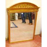 Reproduction gilt wall mirror in the Victorian manner, 117cm high and 91cm wide.