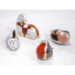Four Royal Crown Derby animal paperweights modelled as a robin redbreast, horse, rabbit and