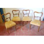 Set of four Victorian rosewood and walnut parlour chairs, each with a shaped top above a scroll back