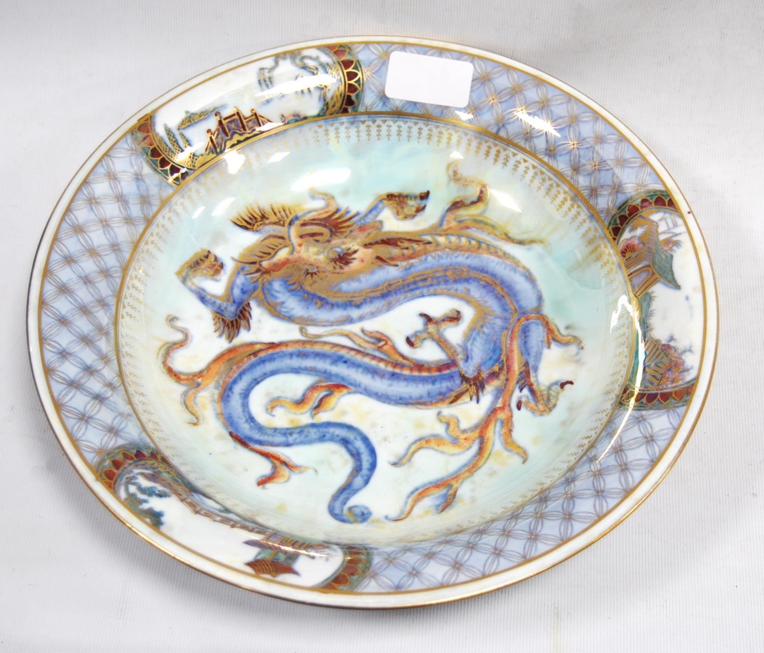 Wedgwood lustre bowl decorated with a dragon to the well and panels of pagodas to the border, 5cm