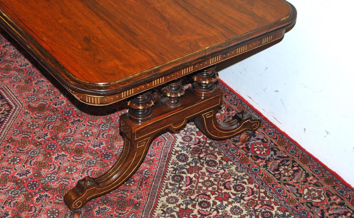 19th century rosewood and parcel gilt coffee table, the rectangular top with canted corners on three - Image 3 of 6