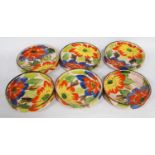 Set of six oriental-style crackle glaze side plates with all over colourful floral panels,