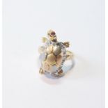 Coloured gold dress ring modelled as a turtle with ruby eyes and diamond-bordered shell and moveable