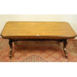 19th century rosewood and parcel gilt coffee table, the rectangular top with canted corners on three