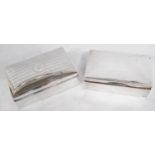 Two silver cigarette boxes, one with engine turned cover.  (2)
