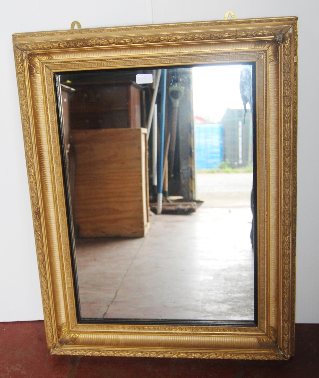 19th century giltwood and gesso wall mirror, with foliate and Greek key decoration, 86cm high and