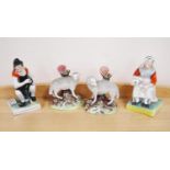 Pair of Staffordshire pottery figures, 'The Cobbler and his wife', 18cm high, and a pair of
