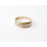 18ct gold ring with five old-cut diamond brilliants, Birmingham 1900, 3.1g, size N.