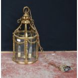 French-style gilt metal and glass lantern hall light, the cylindrical-shaped light decorated with