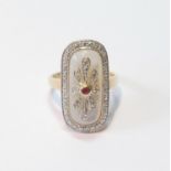 Finger ring with a ruby and diamonds upon pearl, in gold, '18k', 9.4g gross, size O.