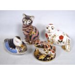 Four Royal Crown Derby animal paperweights modelled as a cat, frog, seal and a duck, stopper to