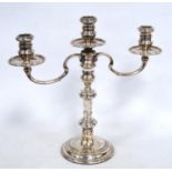 Silver candelabrum of George I style with baluster stem and three lights, by R Comyns, 1957, 30cm,