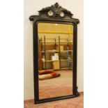 Victorian ebonised pine overmantel mirror, with a carved scroll and fern decorated surmount above