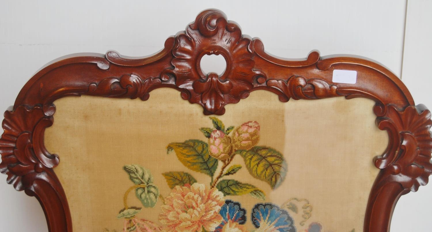 Victorian mahogany fire screen, with a needlepoint panel to the centre depicting flowers in a - Image 2 of 6