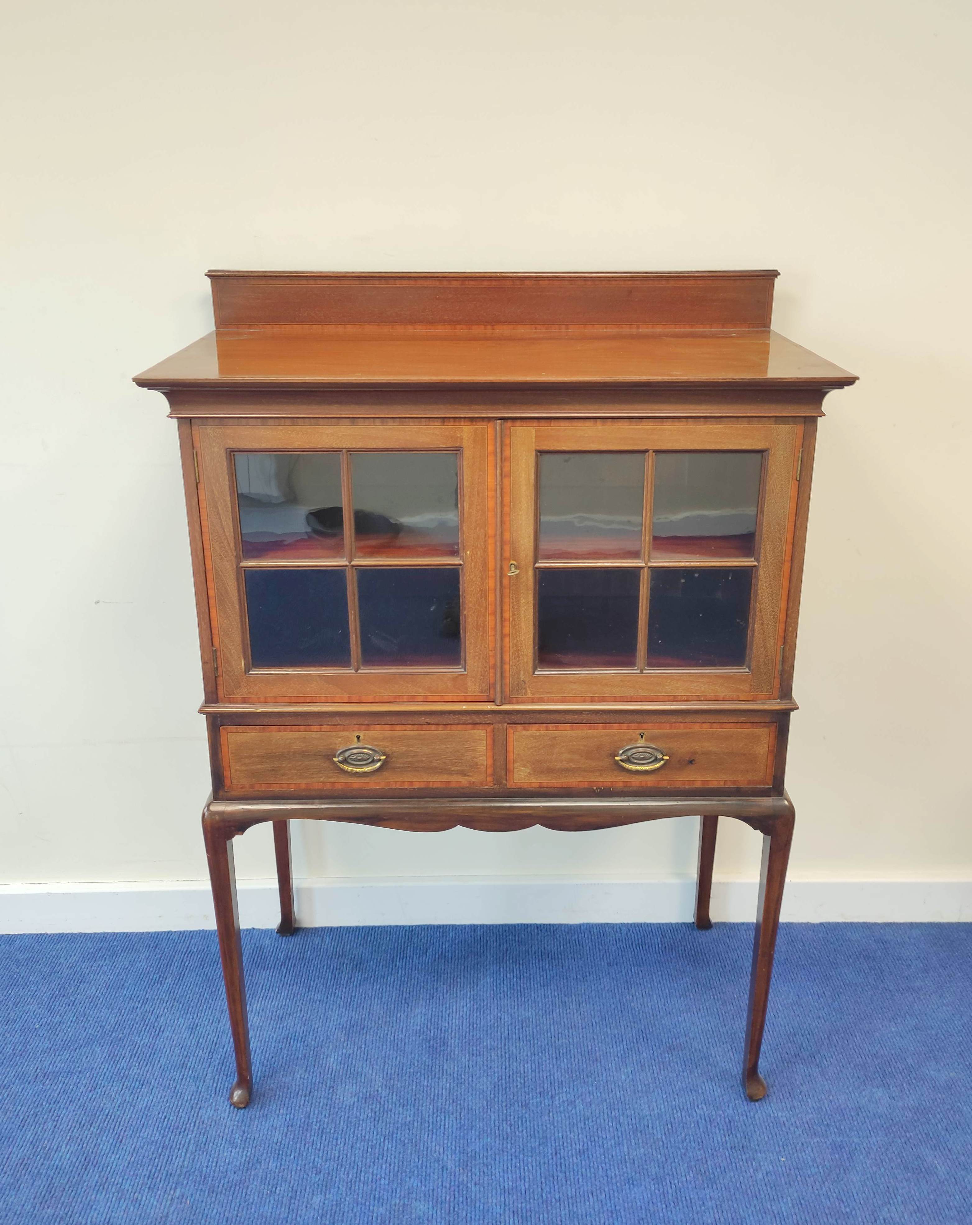 Early 20th century mahogany hall display cabinet with satinwood banding and two glazed doors