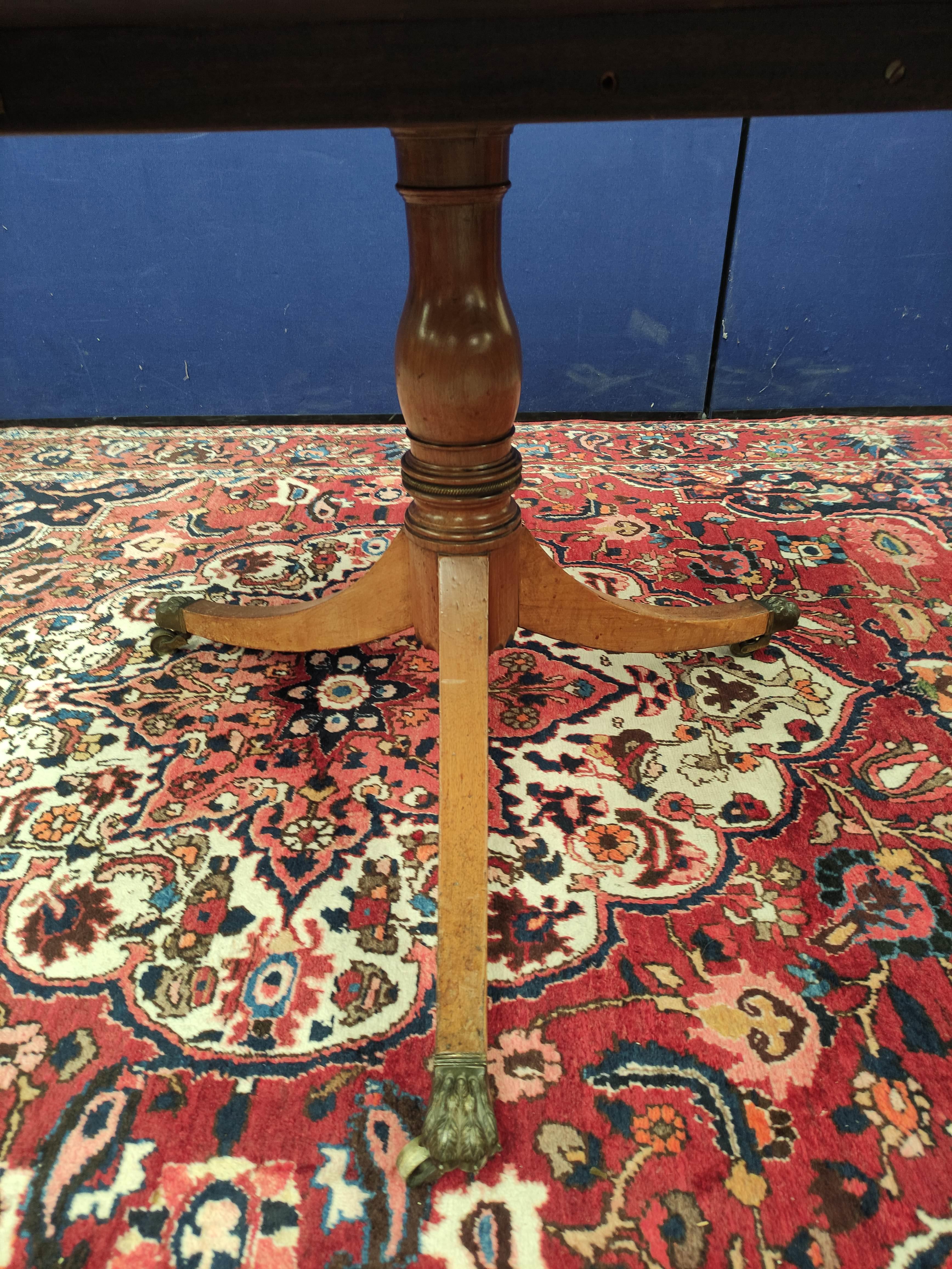 Mahogany breakfast table, the circular snap-action top on a turned column and tripod supports, - Image 4 of 13