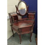 Chinese hardwood dressing table, of quatrefoil shape with oval mirror flanked by fruit finials above